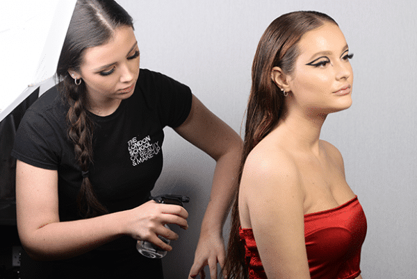Makeup artist doing hair